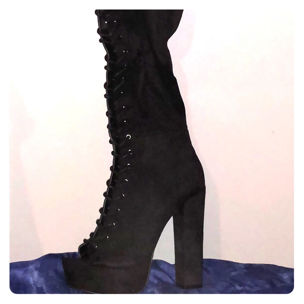 Thigh high lace up boots